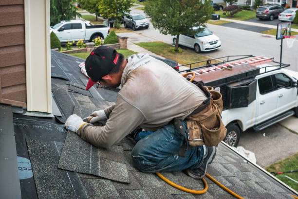 Professional Roofing technician working in Harper, KS